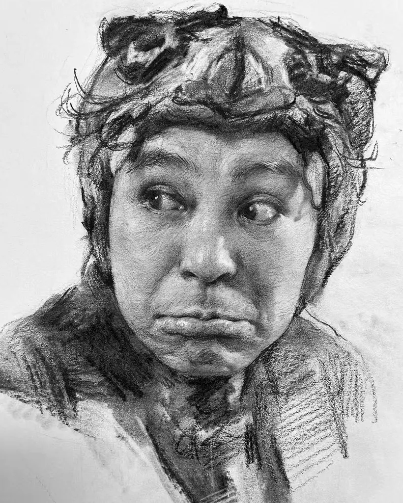 Charcoal portrait drawing of a head